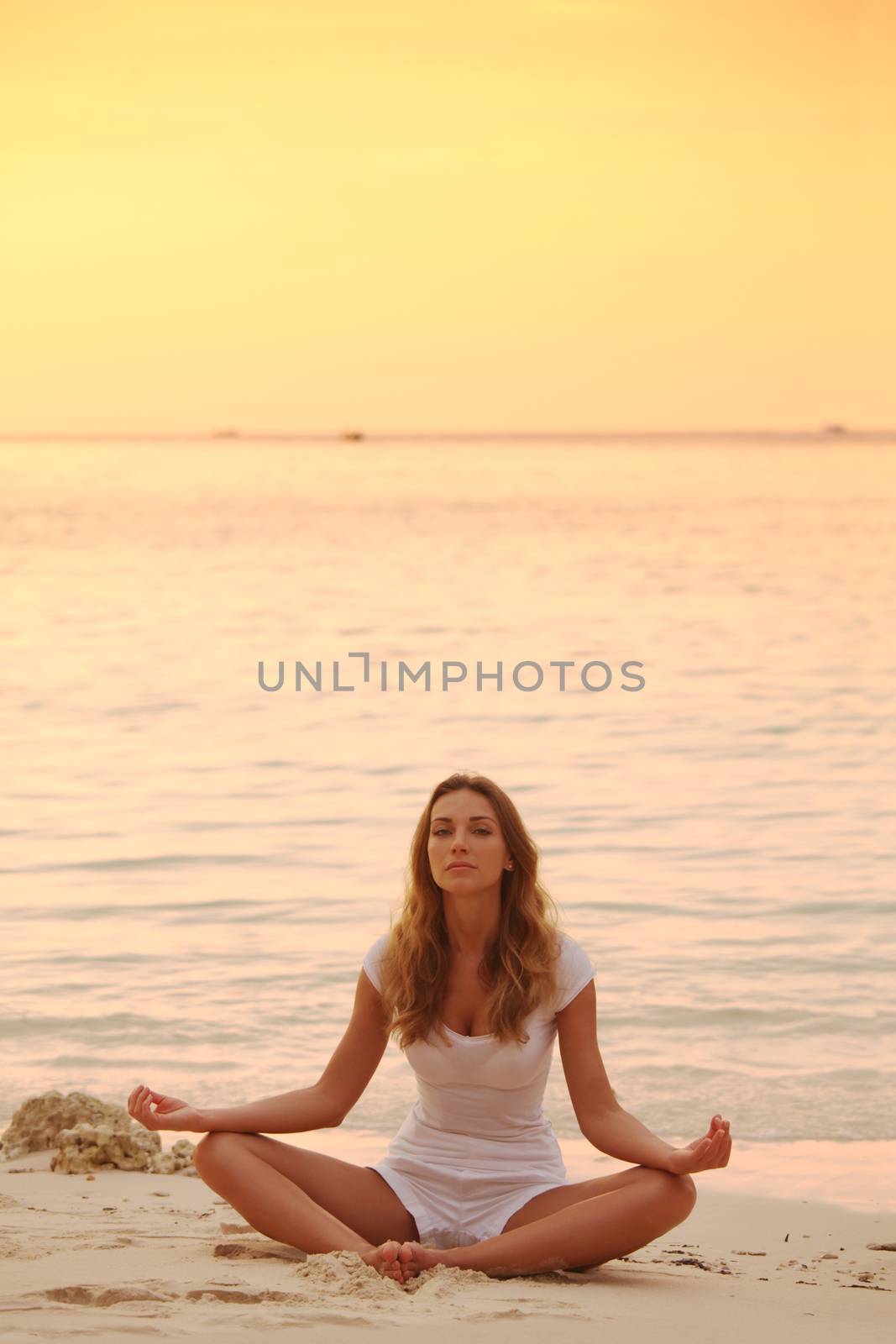 Yoga at sunset by Yellowj