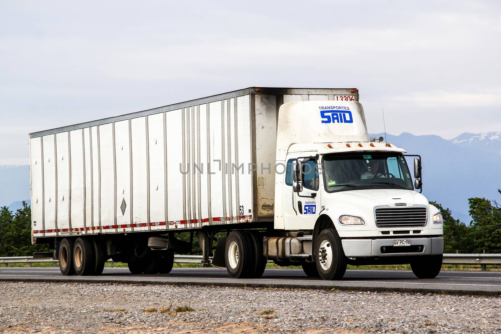 O'HIGGINS, CHILE - NOVEMBER 19, 2015: Semi-trailer truck Freightliner Business Class at the interurban freeway.