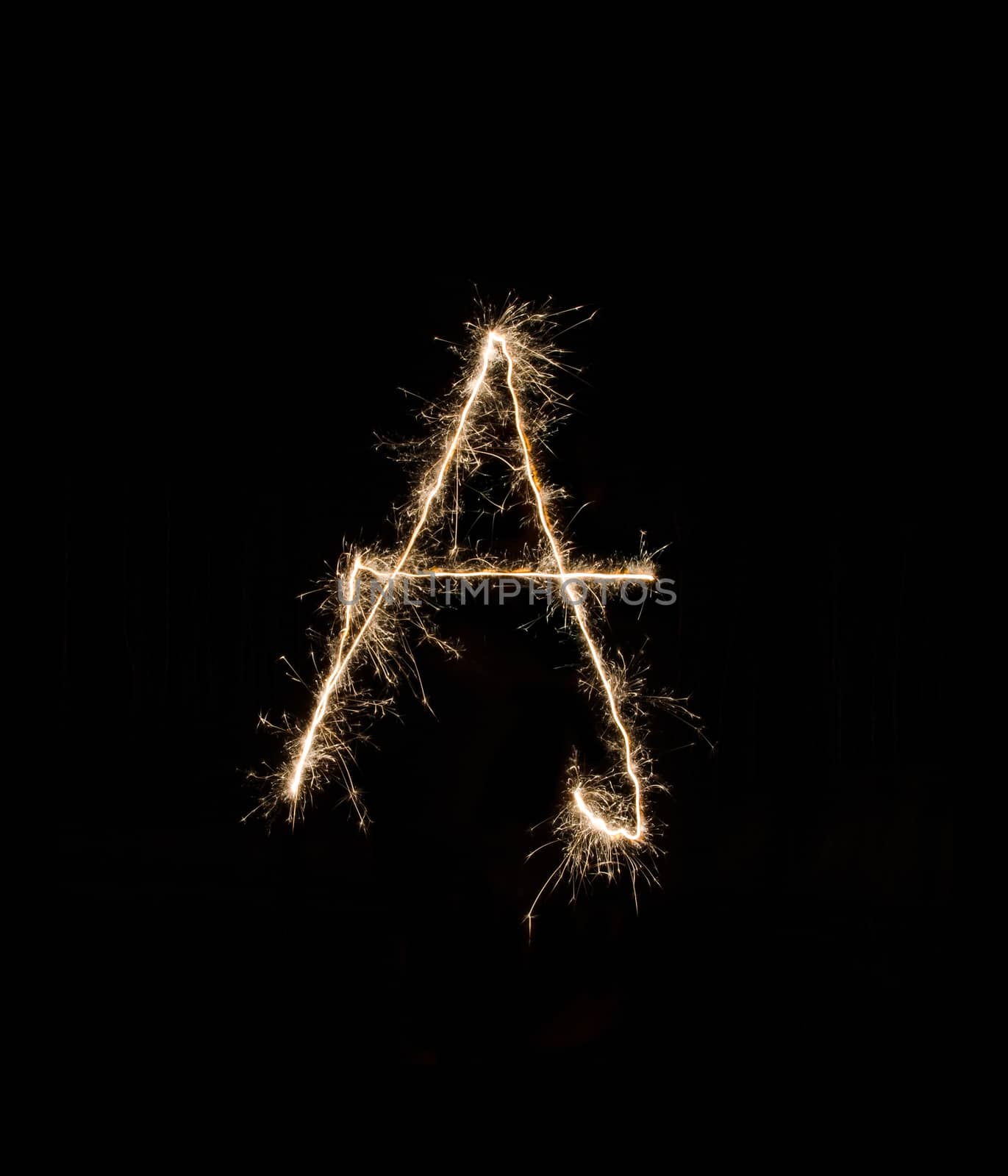 Letter A drew with spakrs on a black background.