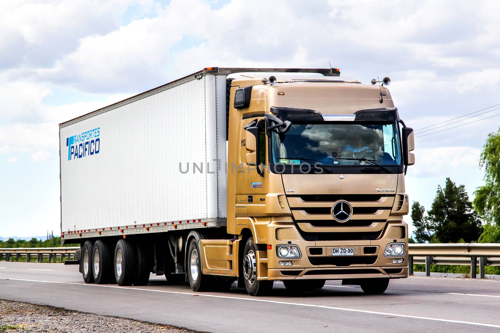 BIO-BIO, CHILE - NOVEMBER 23, 2015: Cargo truck Mercedes-Benz Actros 1854 at the interurban freeway.