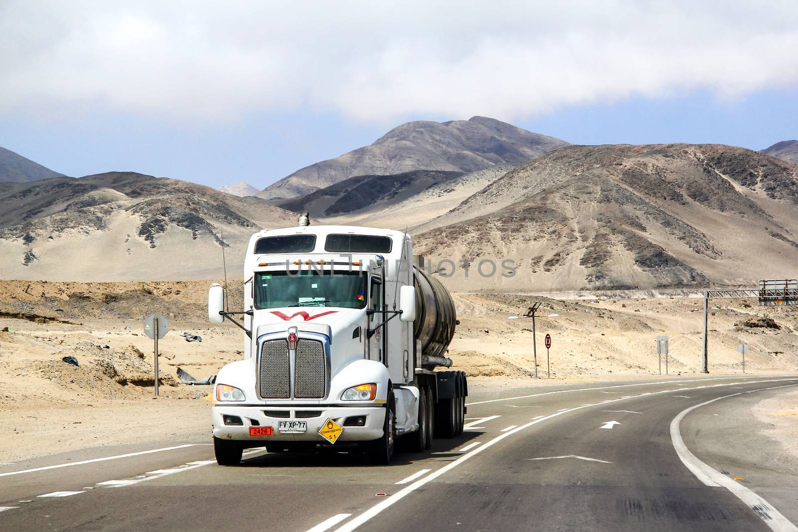 ATACAMA, CHILE - NOVEMBER 14, 2015: Semi-trailer truck Kenworth T660 at the interurban freeway through the Atacama desert.