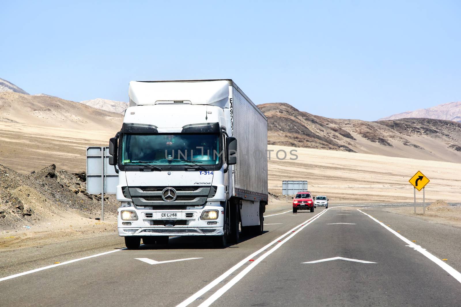 ATACAMA, CHILE - NOVEMBER 14, 2015: Semi-trailer truck Mercedes-Benz Actros at the interurban freeway through the Atacama desert.