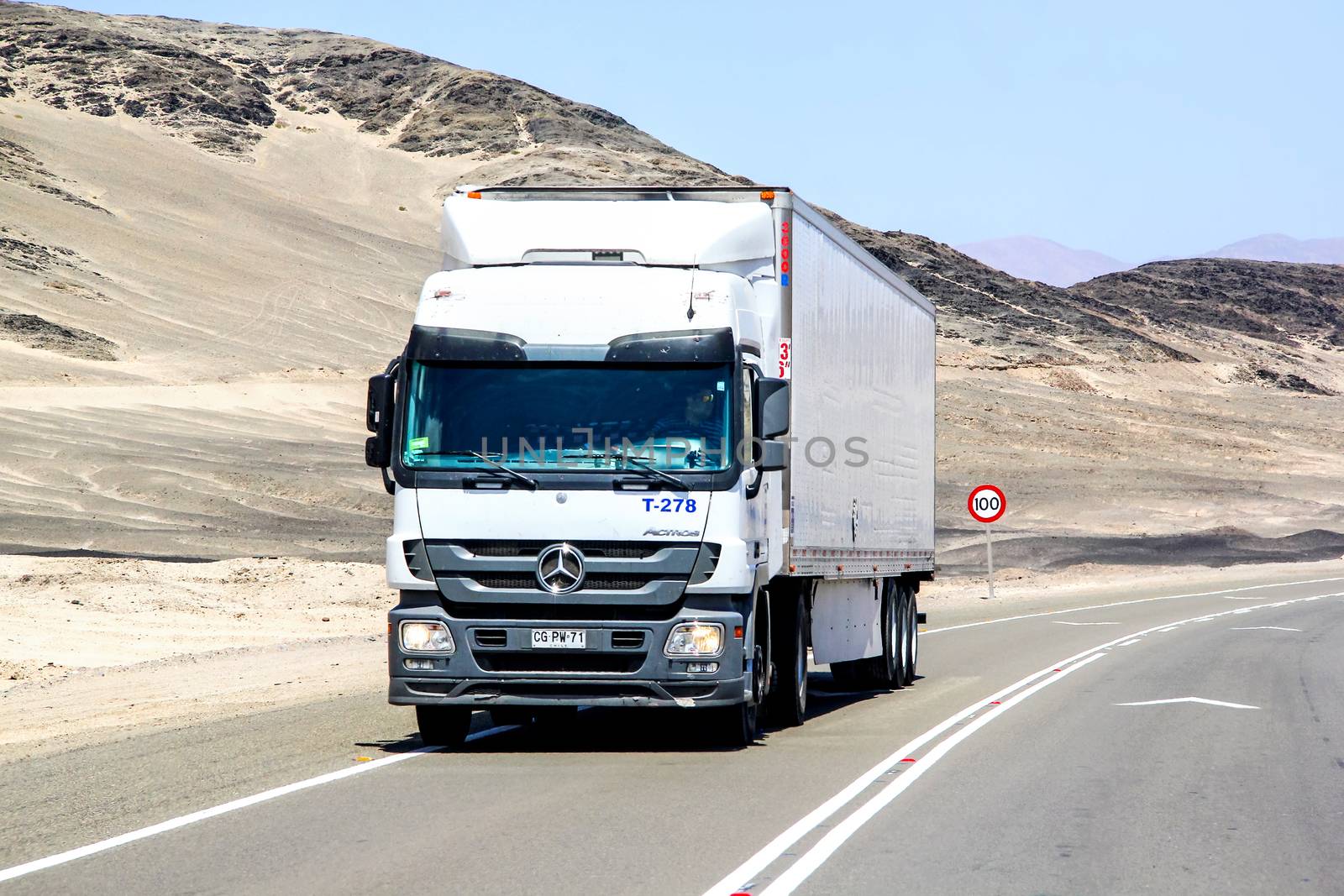 ATACAMA, CHILE - NOVEMBER 14, 2015: Semi-trailer truck Mercedes-Benz Actros at the interurban freeway through the Atacama desert.