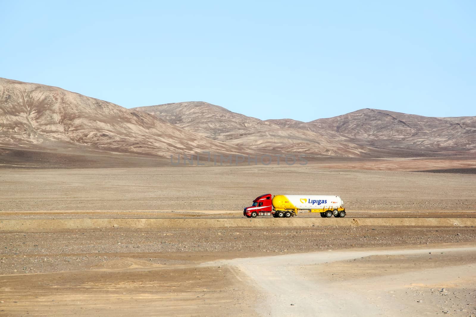 ANTOFAGASTA, CHILE - NOVEMBER 14, 2015: Semi-trailer truck Freightliner Century Class at the interurban freeway through the Atacama desert.