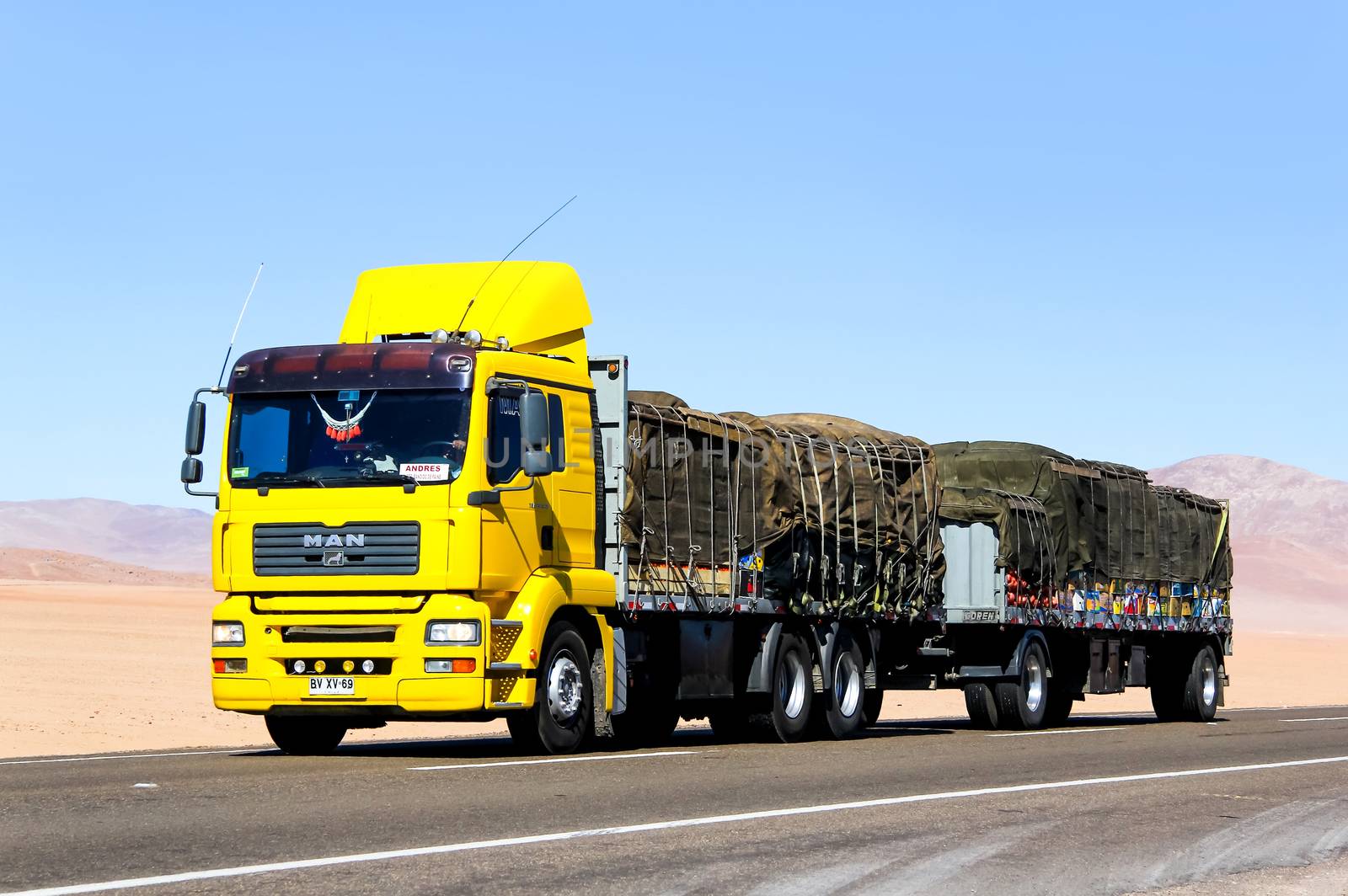 ATACAMA, CHILE - NOVEMBER 14, 2015: Modern truck MAN TGA at the interurban freeway through the Atacama desert.