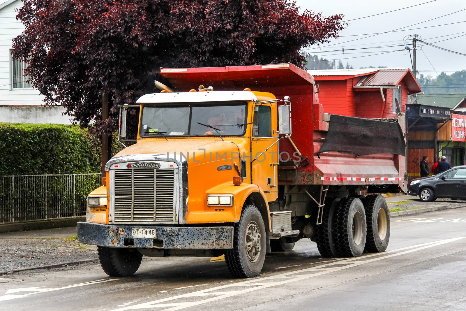 VILLARRICA, CHILE - NOVEMBER 20, 2015: Dump truck Freightliner FLD in the town street.