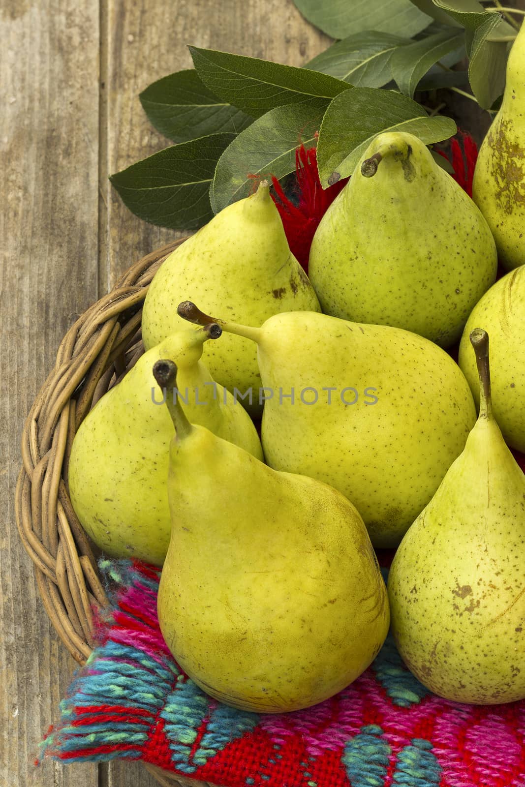 Natural pears on wooden background by Kidza