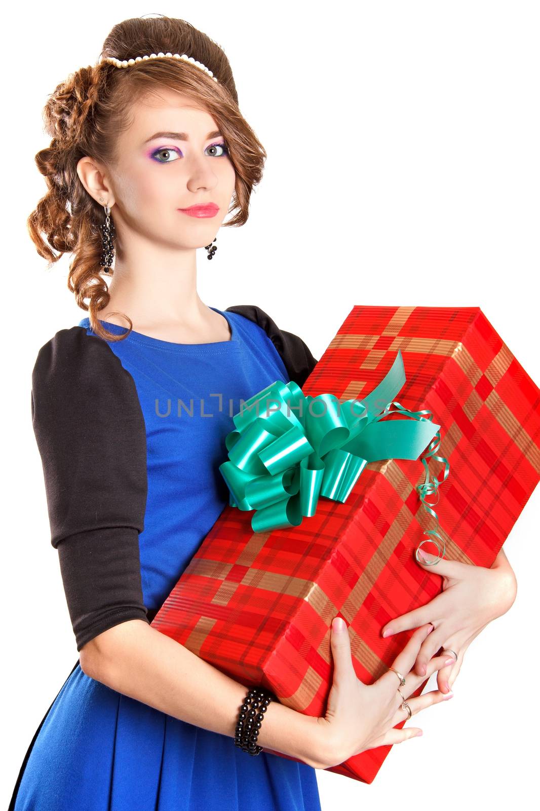 Portrait of a beautiful young woman holding a big gift by Artzzz