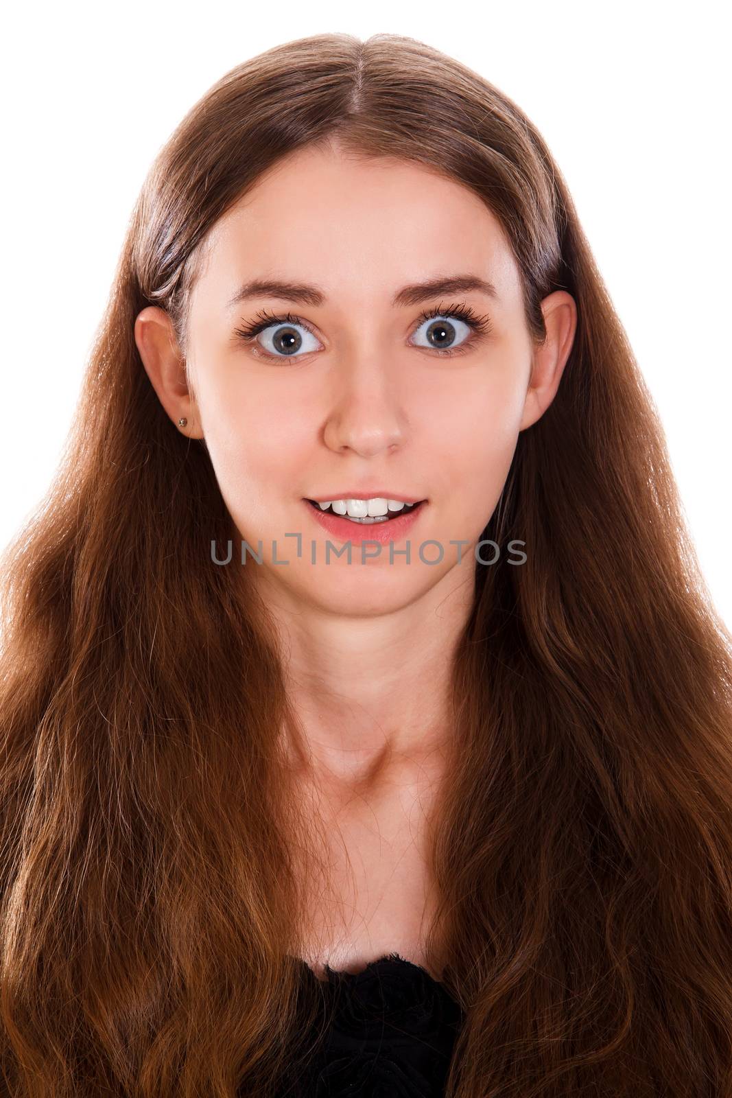 Amazed young woman isolated over white background
