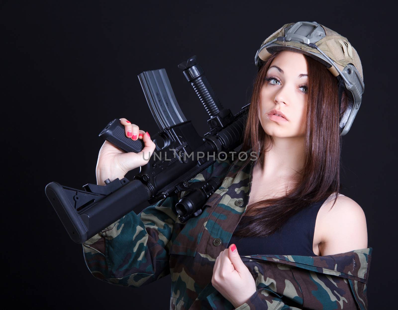 Portrait of a woman in a military uniform with an assault rifle by Artzzz