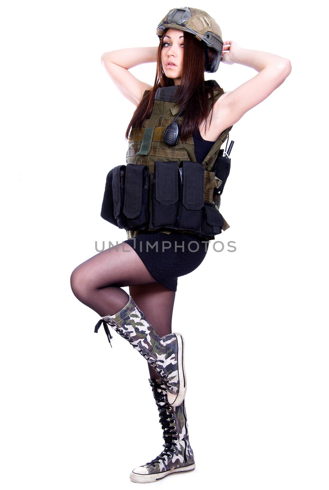 Woman in a military camouflage isolated over white background