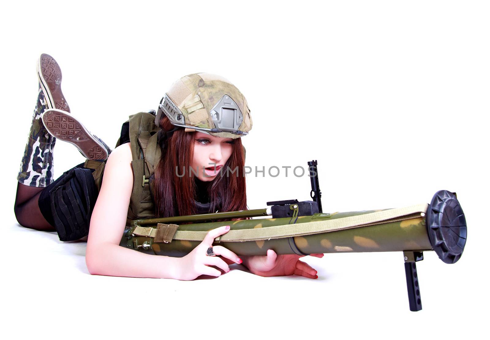 Woman in a military camouflage with a grenade launcher isolated over white background