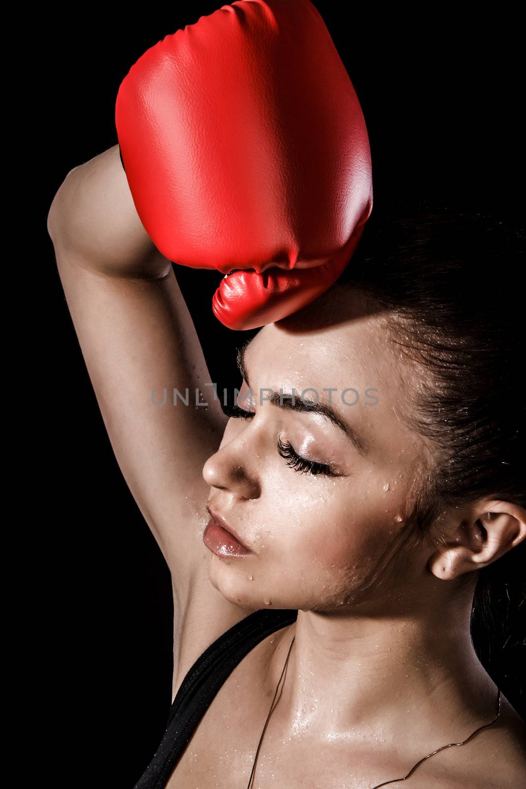 Beautiful young woman in a red boxing gloves by Artzzz