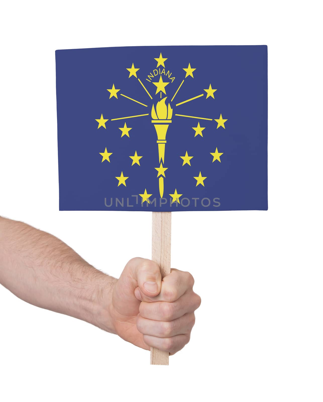 Hand holding small card, isolated on white - Flag of Indiana