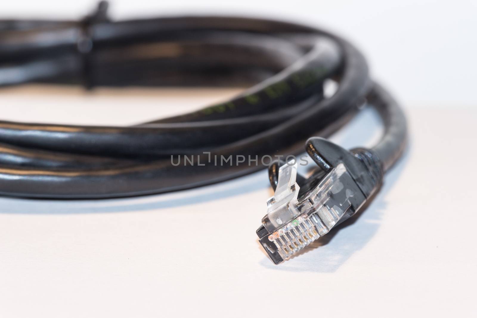 The black internet cable on white background