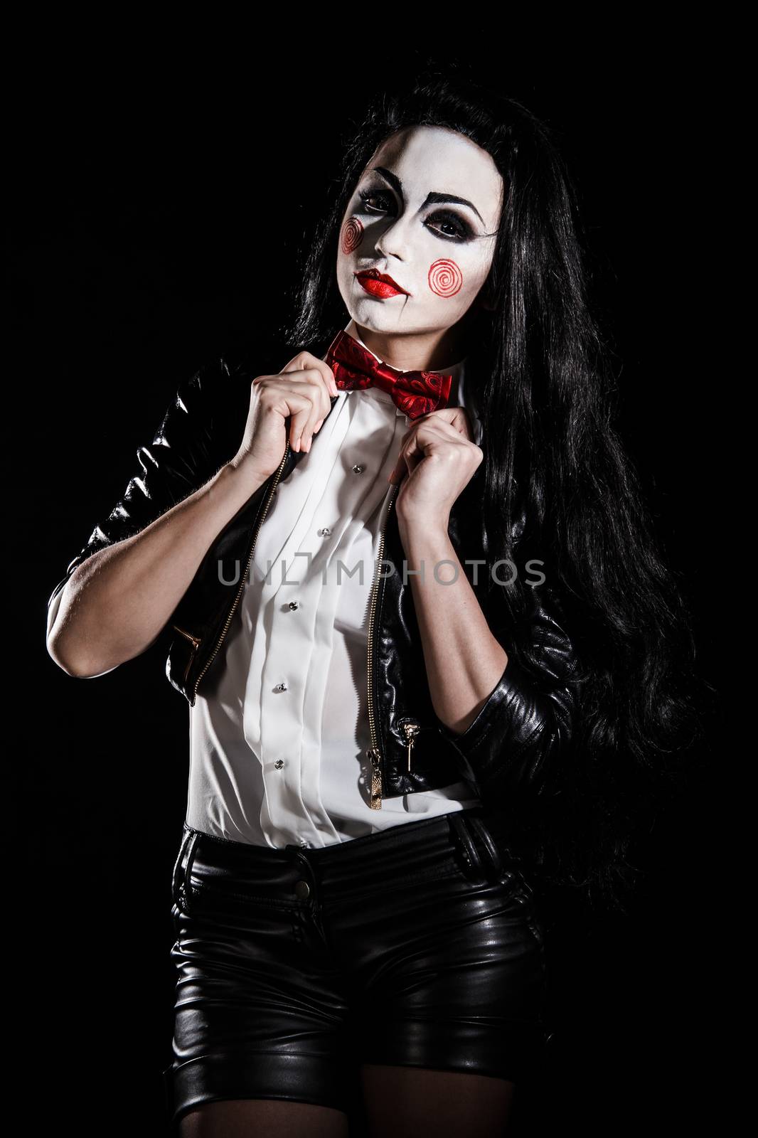 Woman with a Saw film cosplay makeup over black background