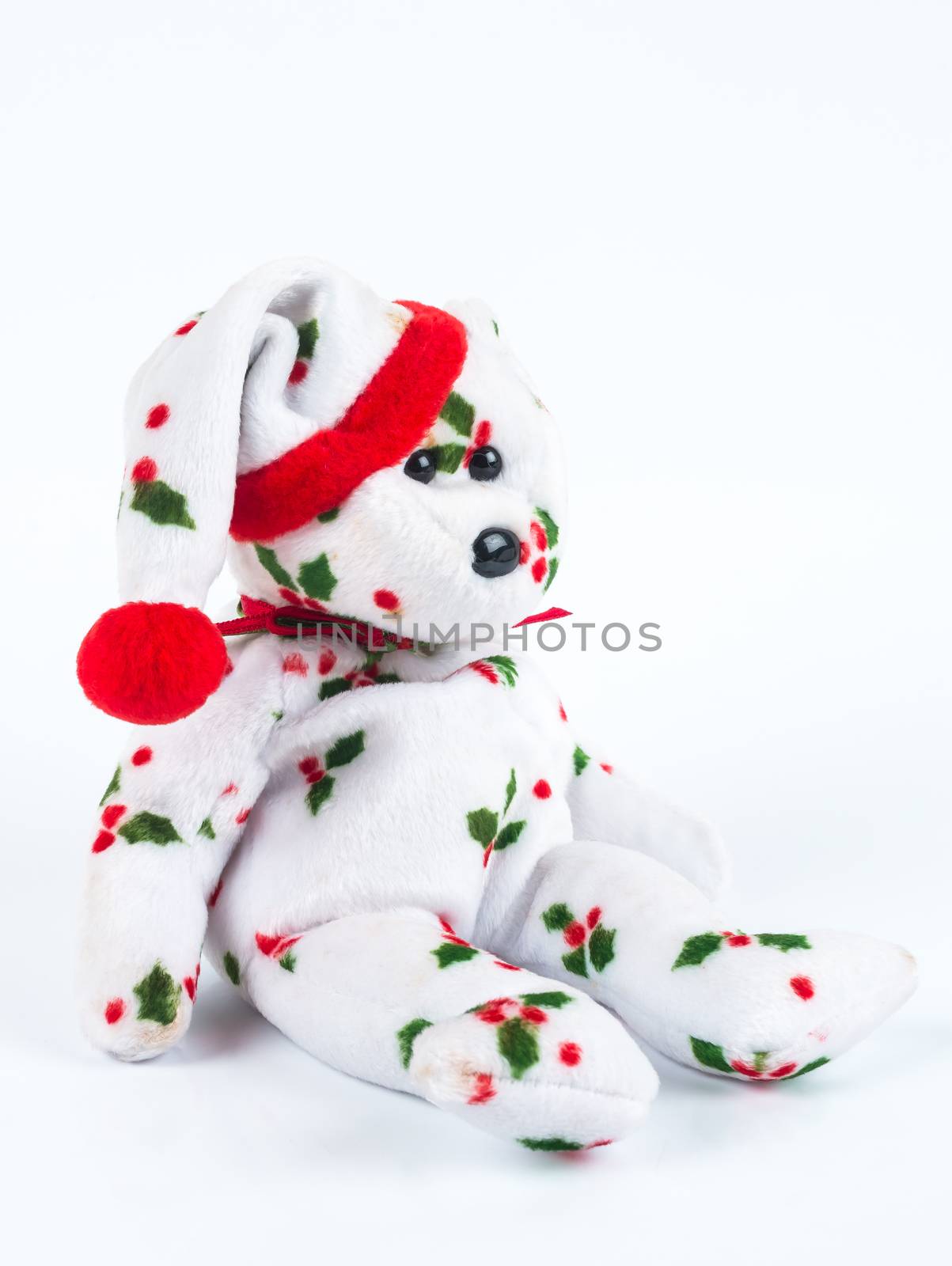 bear doll with christmas hat and suit on white background