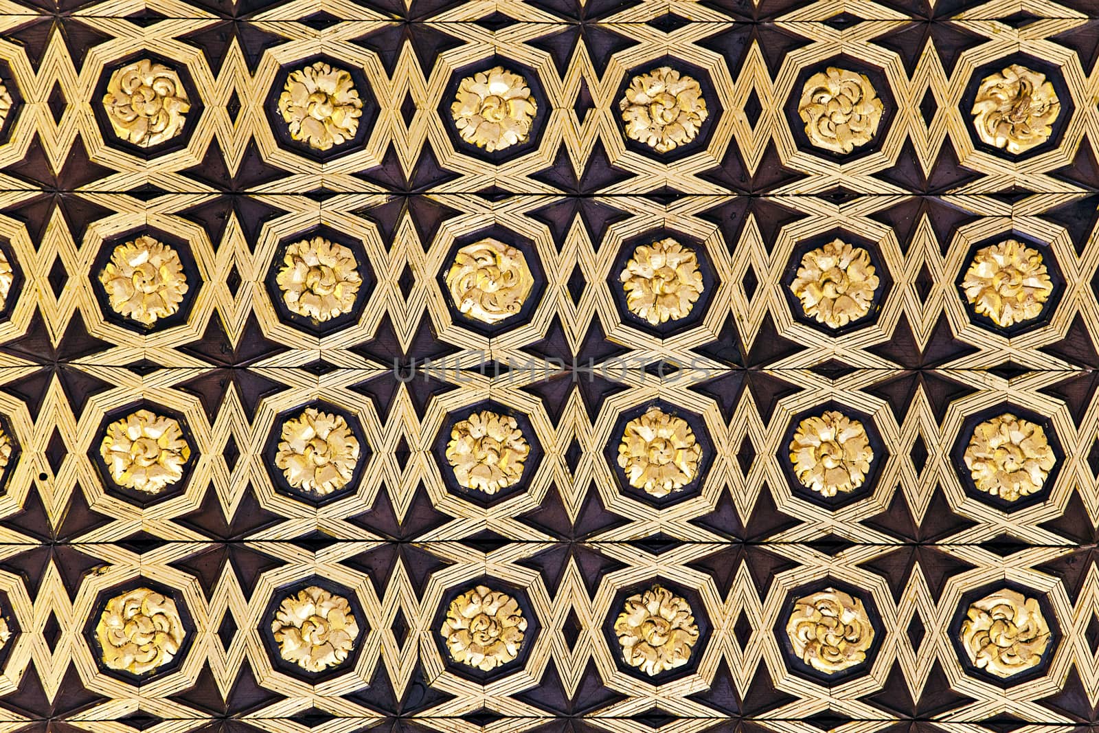 Gild wallpaper in Alcazar palace in Seville, Spain