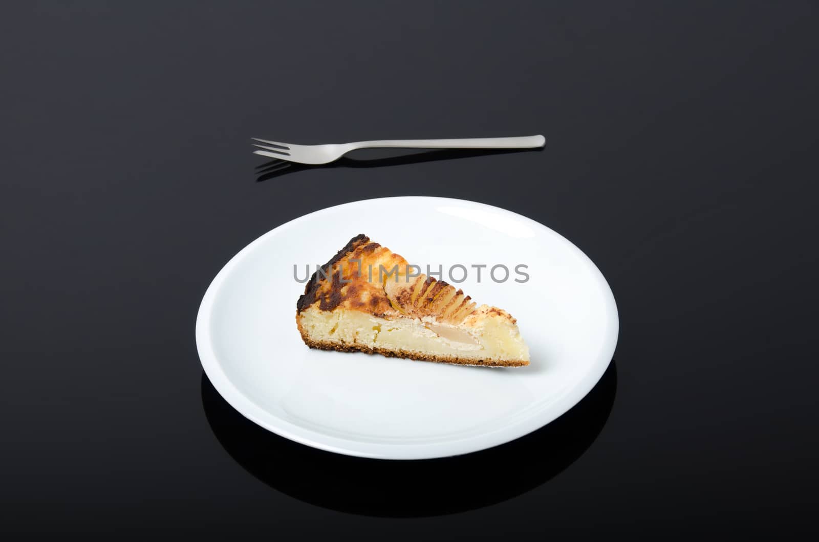 Plate with piece of pear pie by richpav