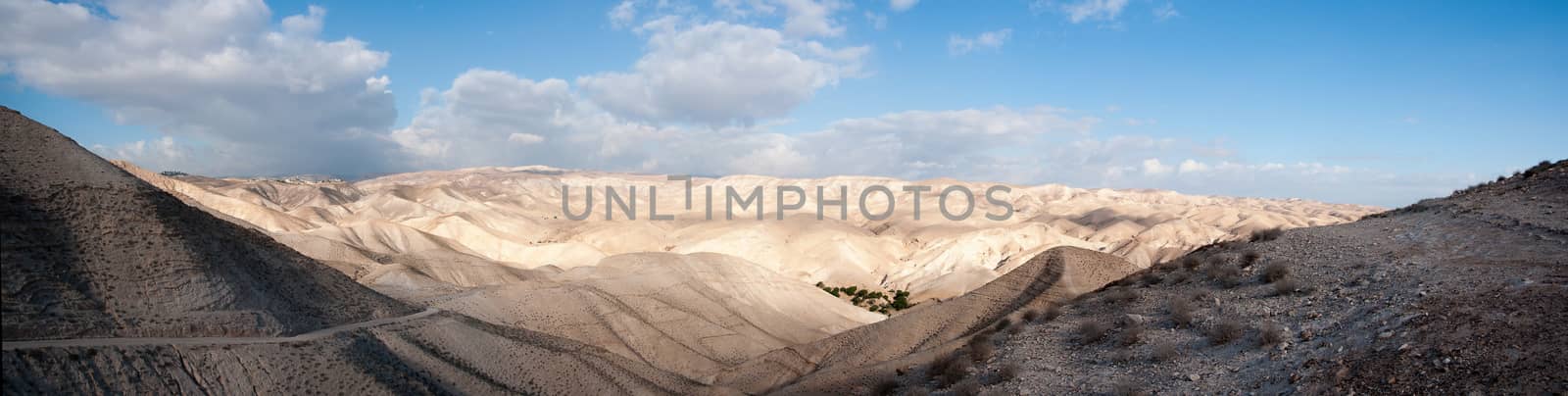 Christian travel in judean desert panorama by javax