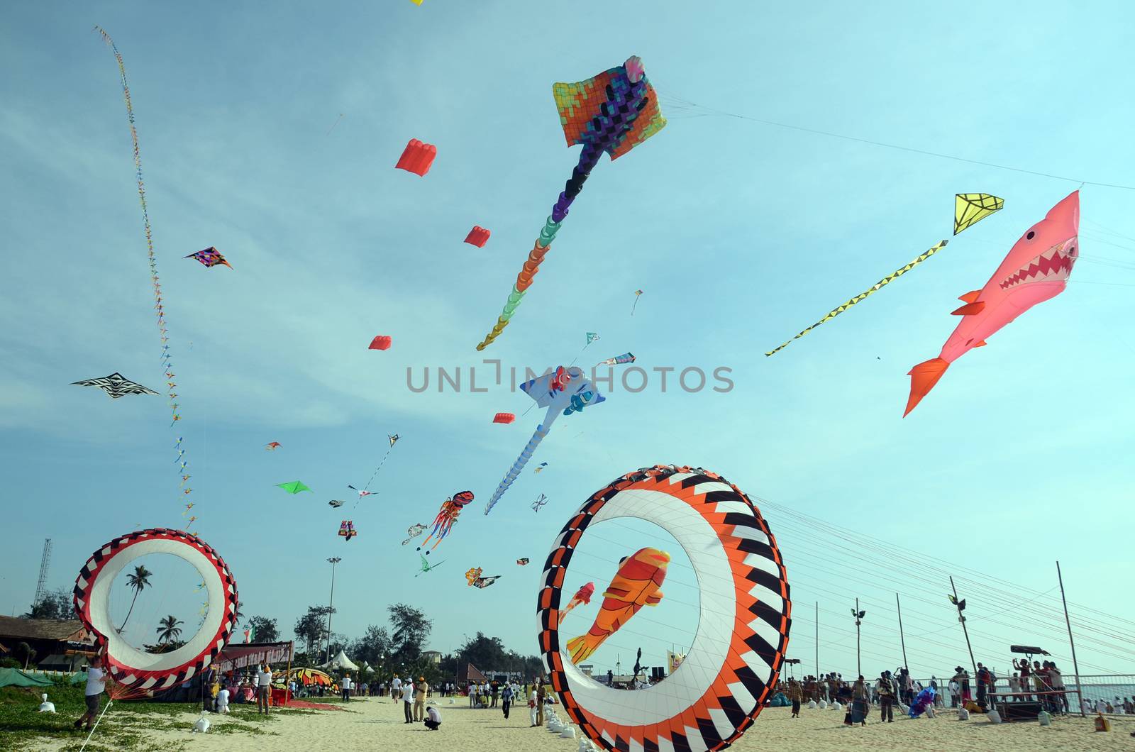 INDIA, Mangaluru: Kites are seen at Panambur beach, Mangaluru, south-east India on January 16, 2016 as the International Kite festival starts. 