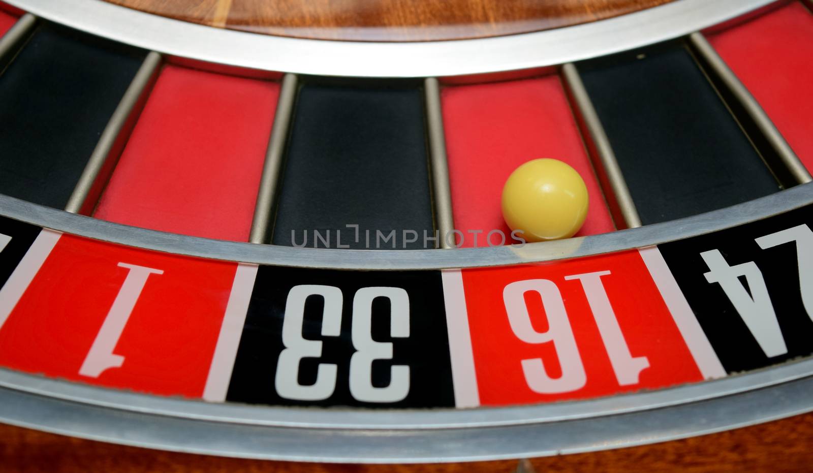 ball in winning number sixteen at roulette wheel