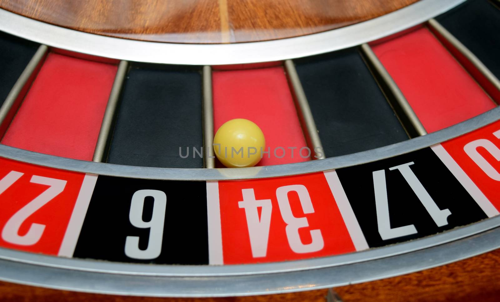 ball in winning number thirty four at roulette wheel