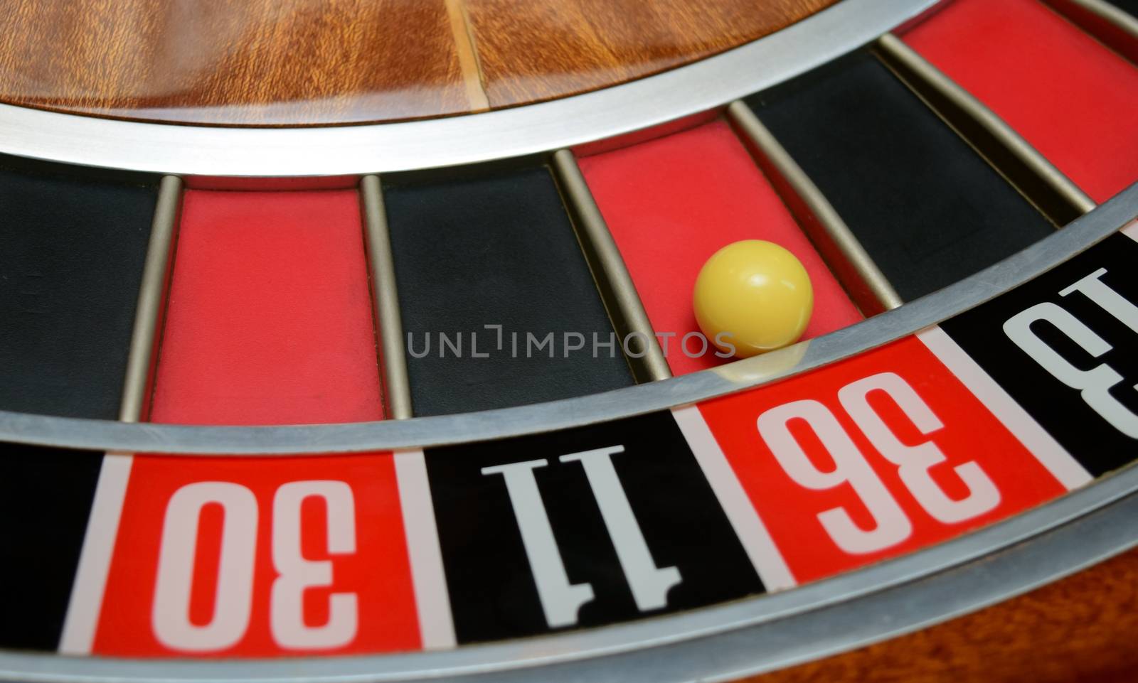 ball in winning number thirty six at roulette wheel