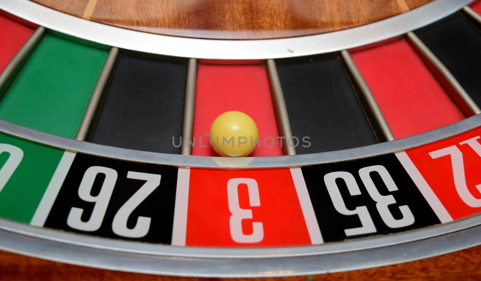 ball in winning number three at roulette wheel