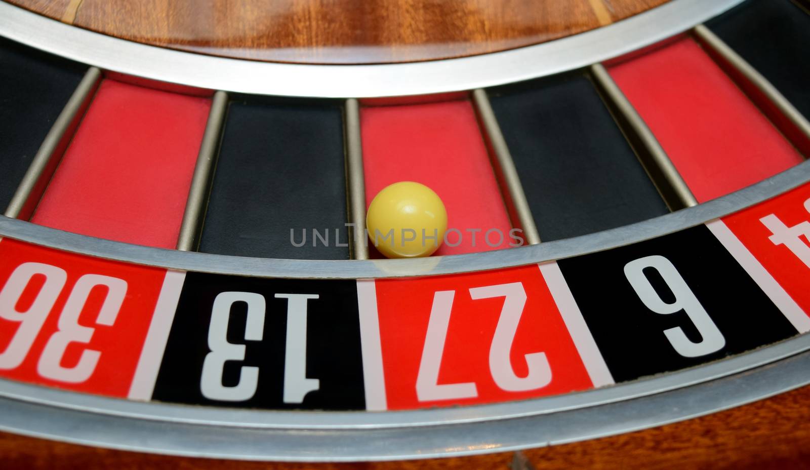 ball in winning number twenty seven at roulette wheel