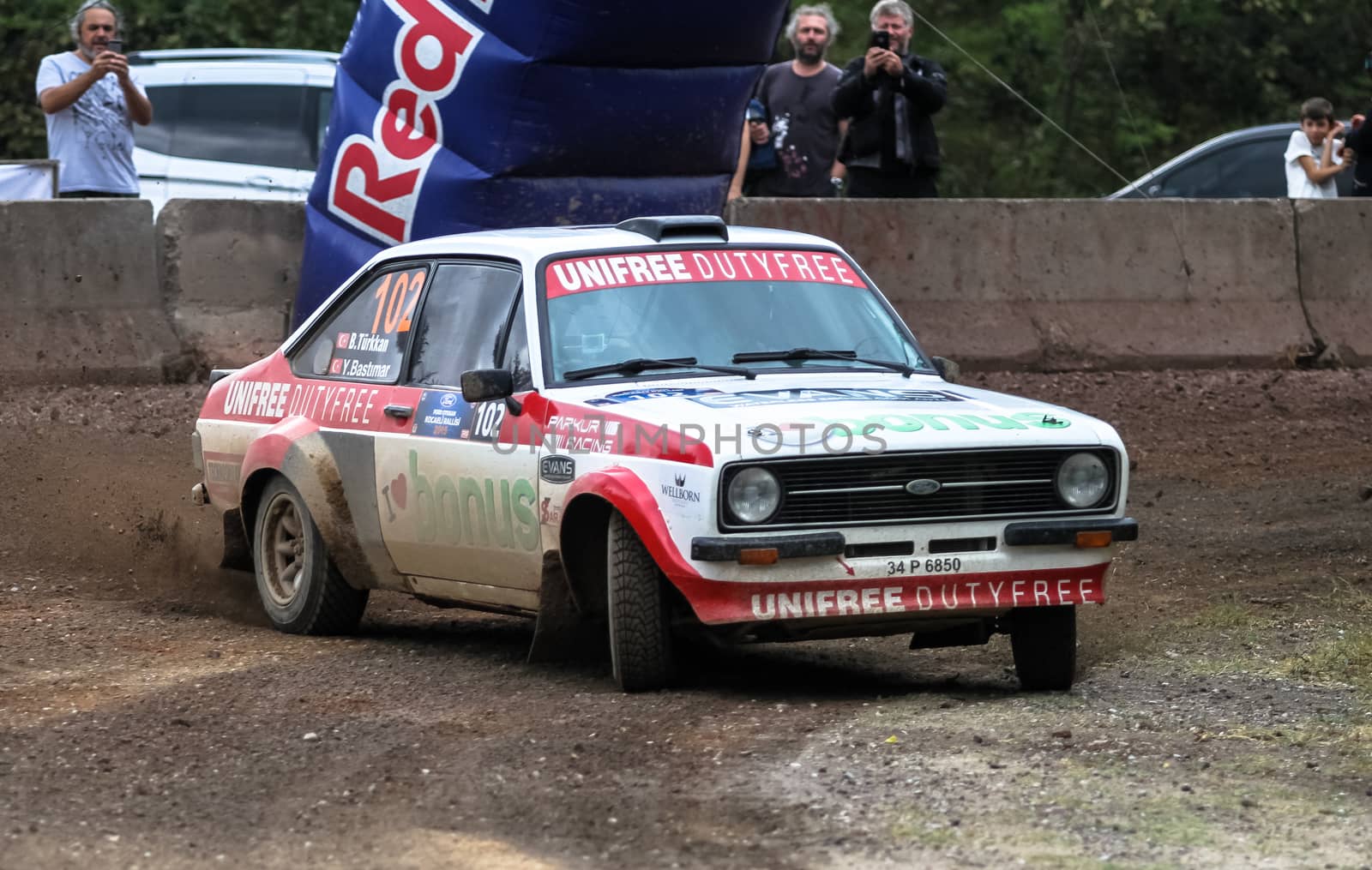 KOCAELI, TURKEY - AUGUST 23, 2015: Burak Turkkan with Ford Escort MK2 of Bonus Unifree Parkur Racing Team in Kocaeli Rally 2015