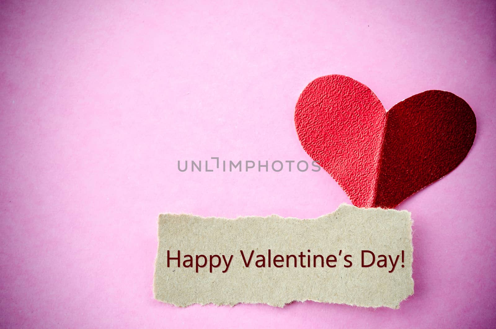 Happy Valentine's Day card with paper heart shape and free space.