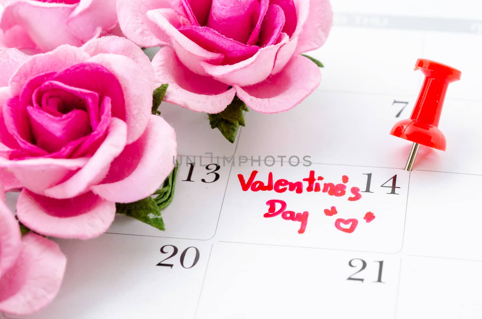 Calendar with rose showing the date 14th of February, the Valentines Day.