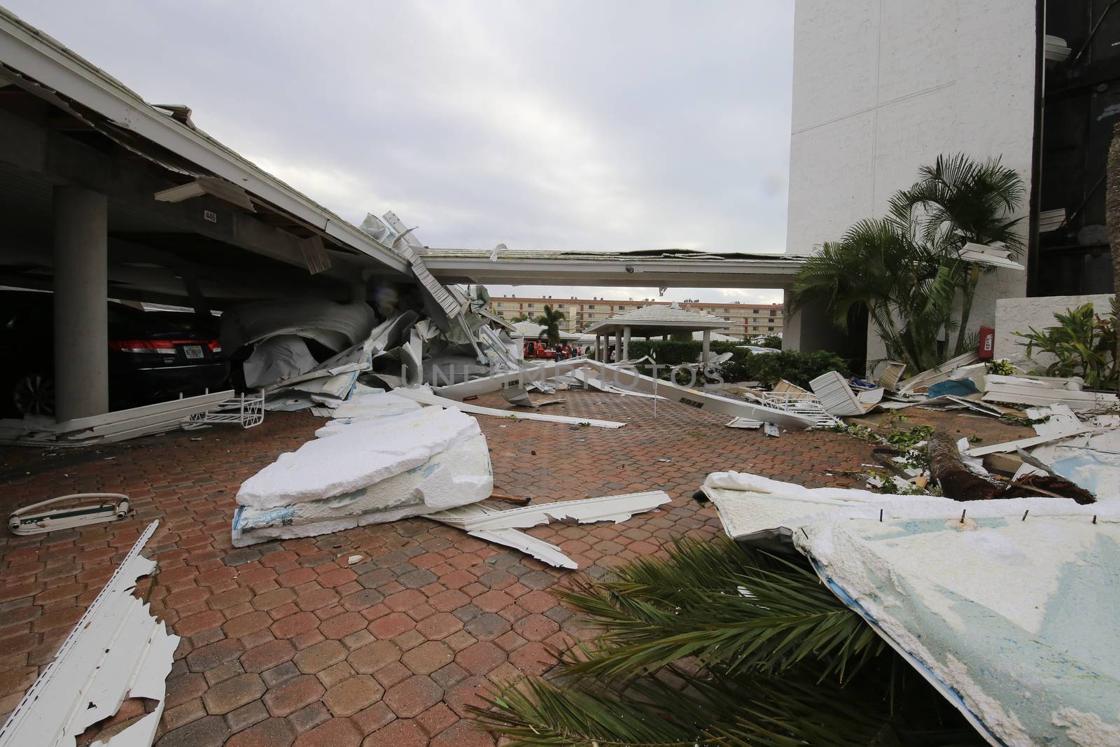 UNITED STATES, Siesta Key: A heavily damaged car park is seen in the aftermath of a tornado, on Midnight Pass Road in Siesta Key, Florida, on January 17, 2016. At least two people are dead near Sarasota after tornadoes and severe thunderstorms crossed central and South Florida on January 17, 2016. 