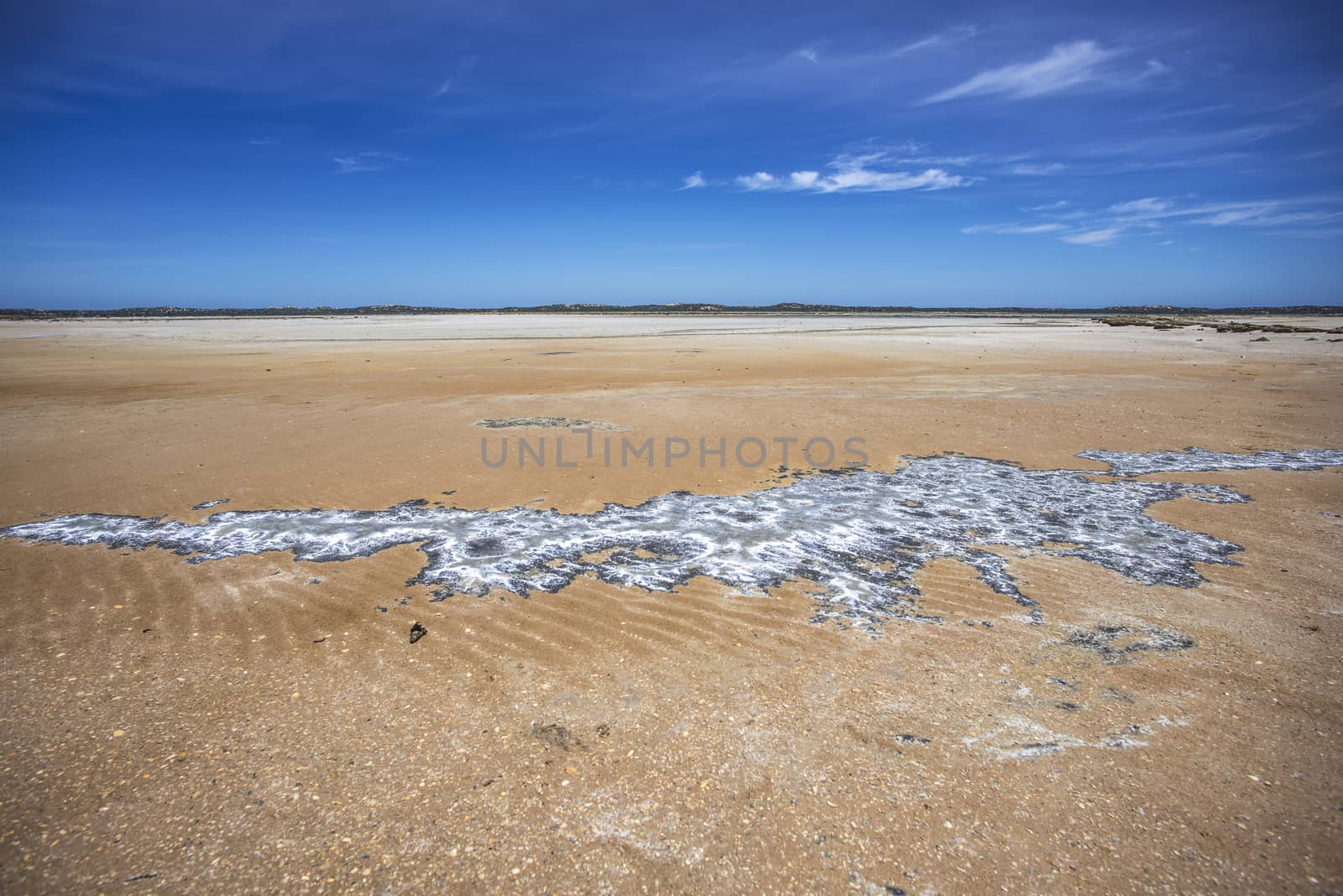 Interesting rock formations in the sand at low tide