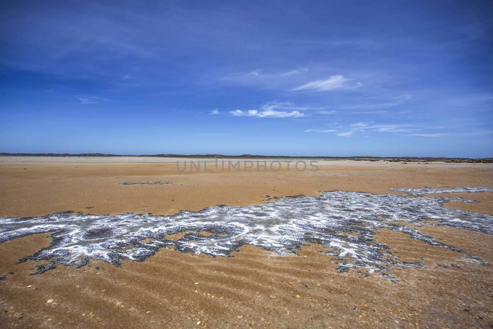 Interesting rock formations in the sand at low tide