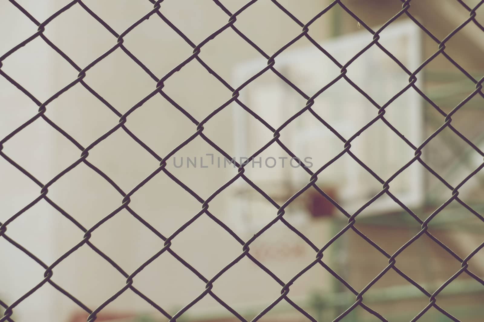 Close up metal net with blur basketball hoop in vintage style.