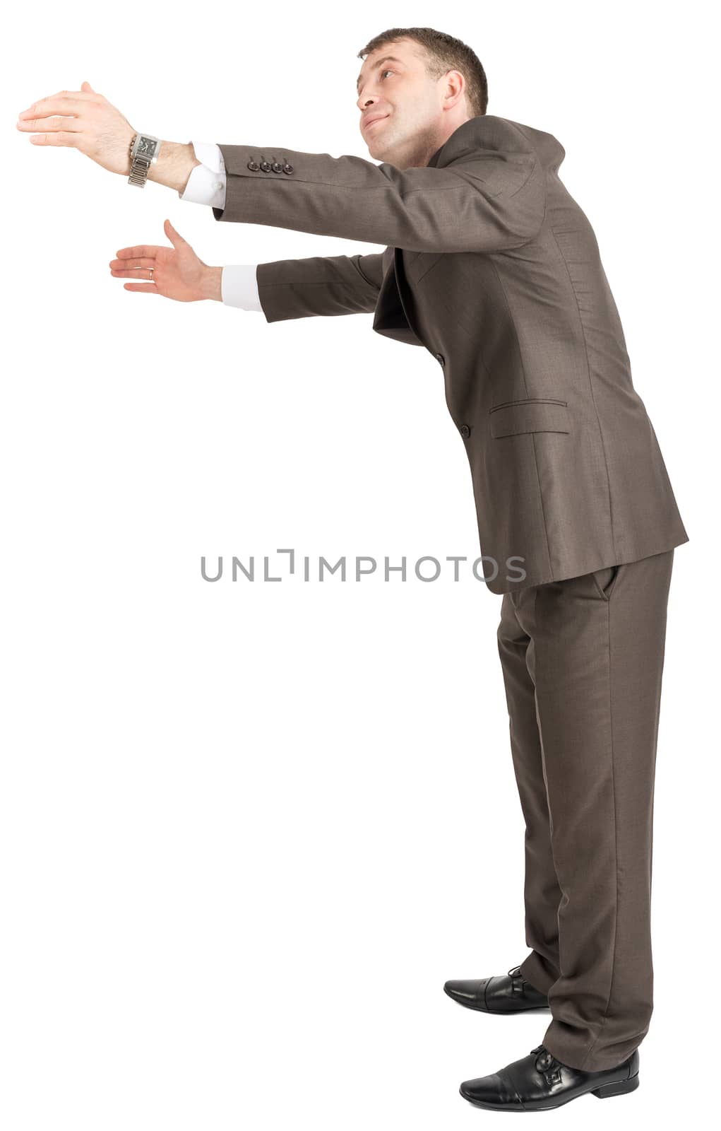 Businessman hugging empty space isolated on white background