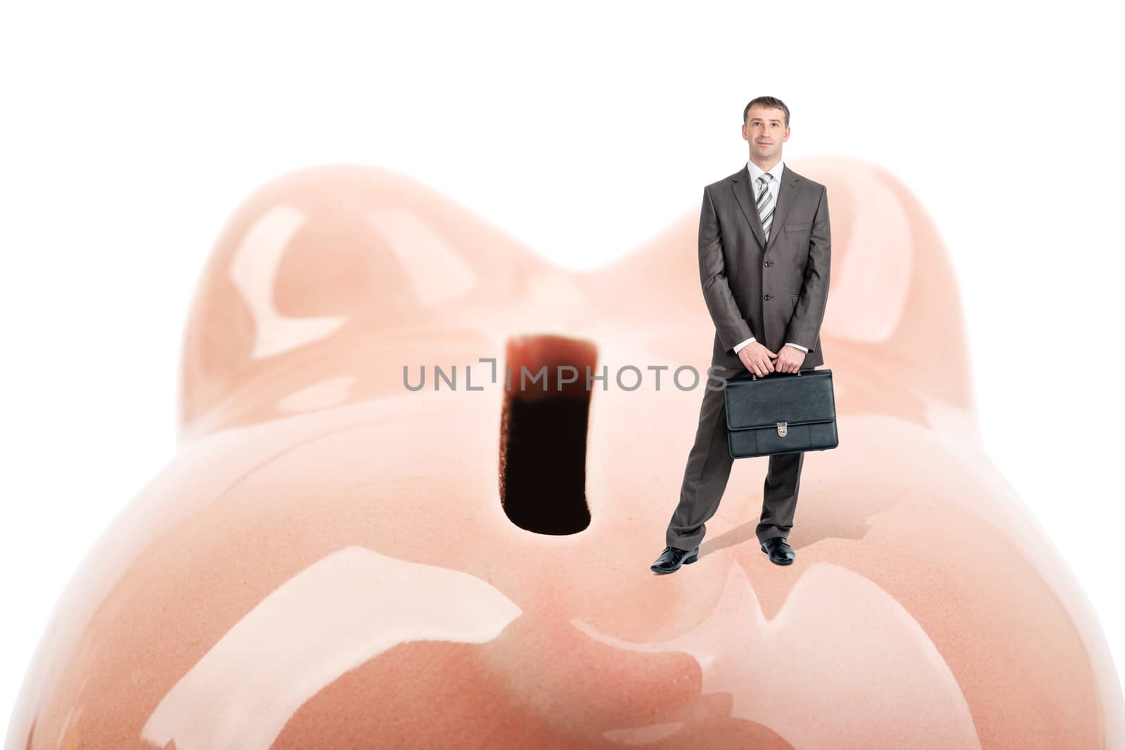 Businessman with suitcase on piggy bank by cherezoff