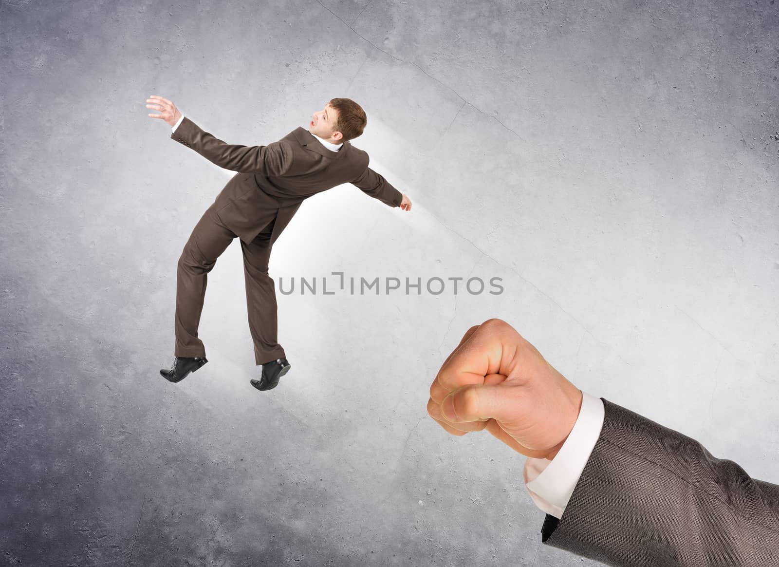 Businessman hitting little man on abstract grey background