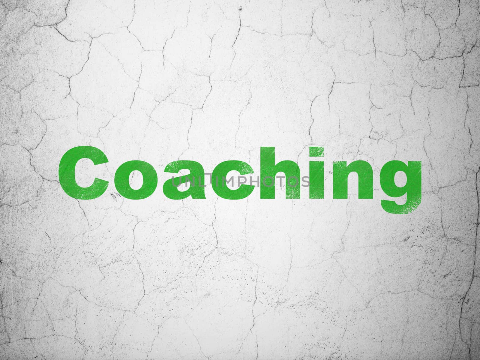Education concept: Green Coaching on textured concrete wall background