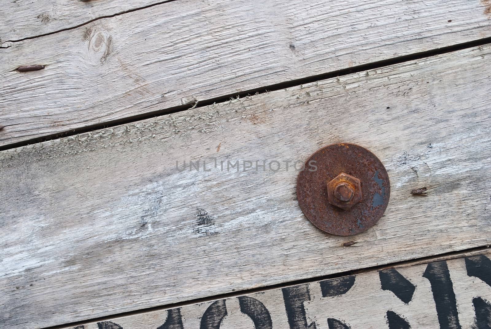 Old wood with rusty old nuts, texture for background. by rakoptonLPN