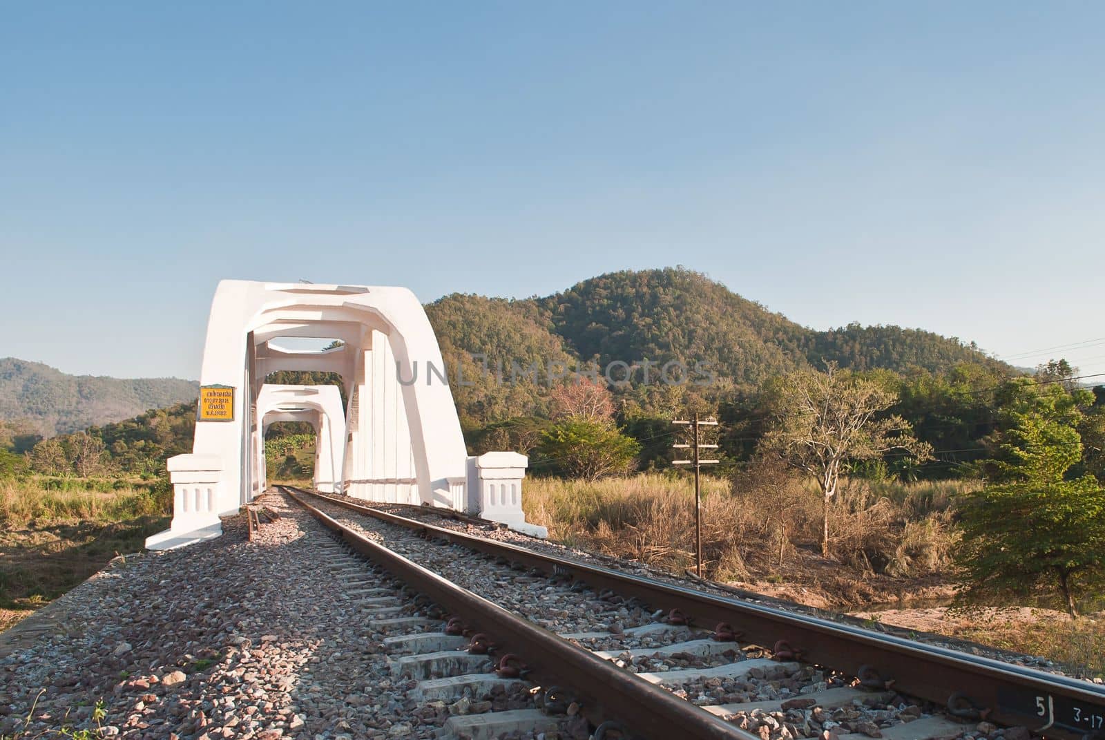 White concrete train bridge, of Northern Thailand by rakoptonLPN