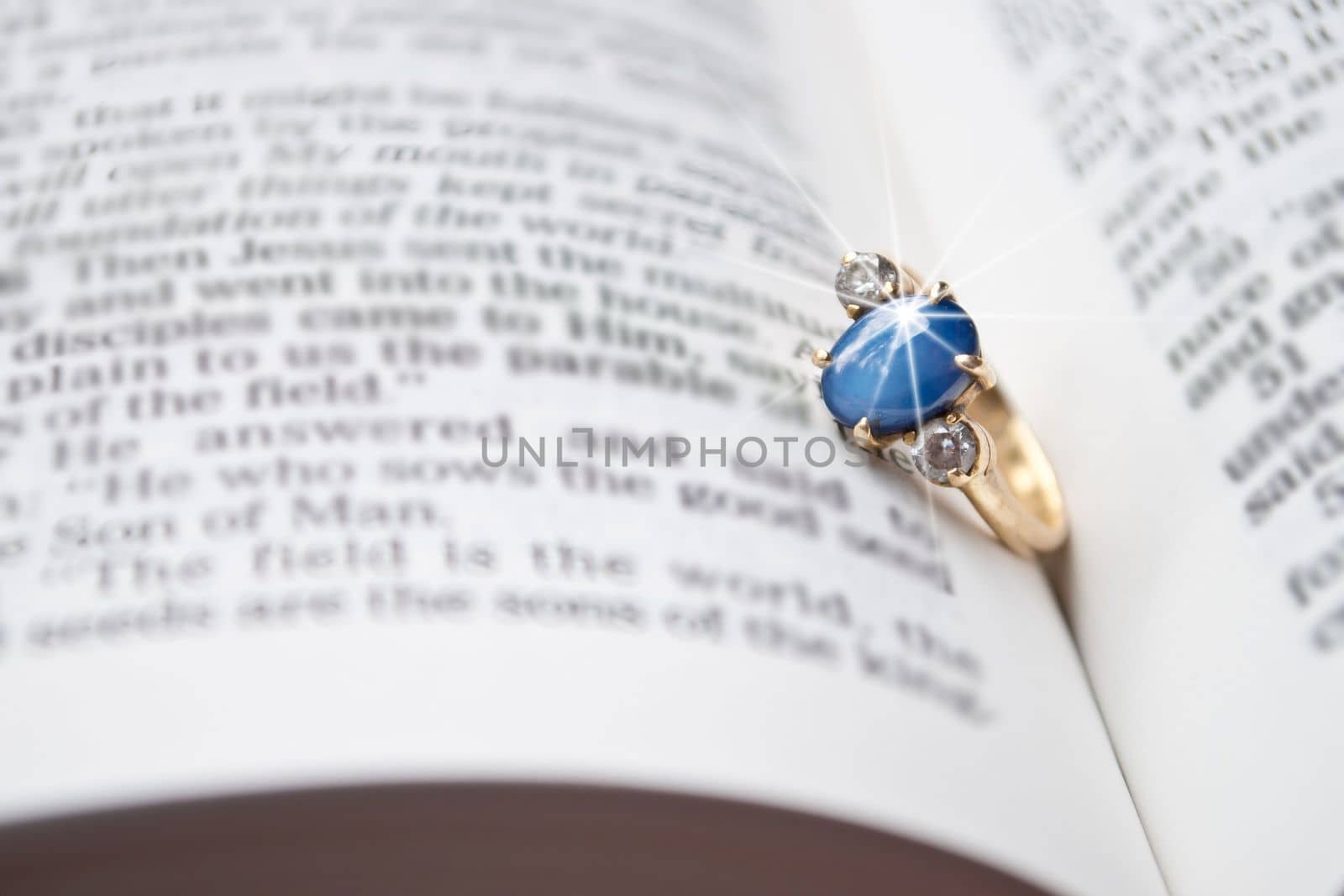 wedding ring on the old book by rakoptonLPN