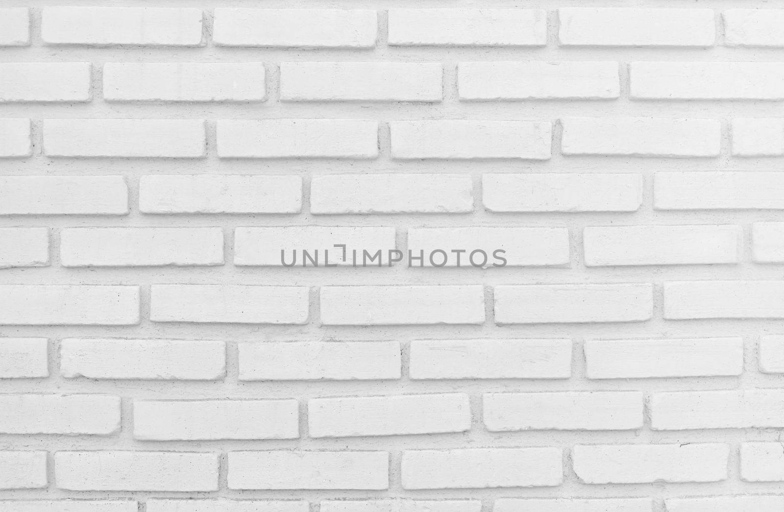 White misty brick wall for background or texture, lighting right side