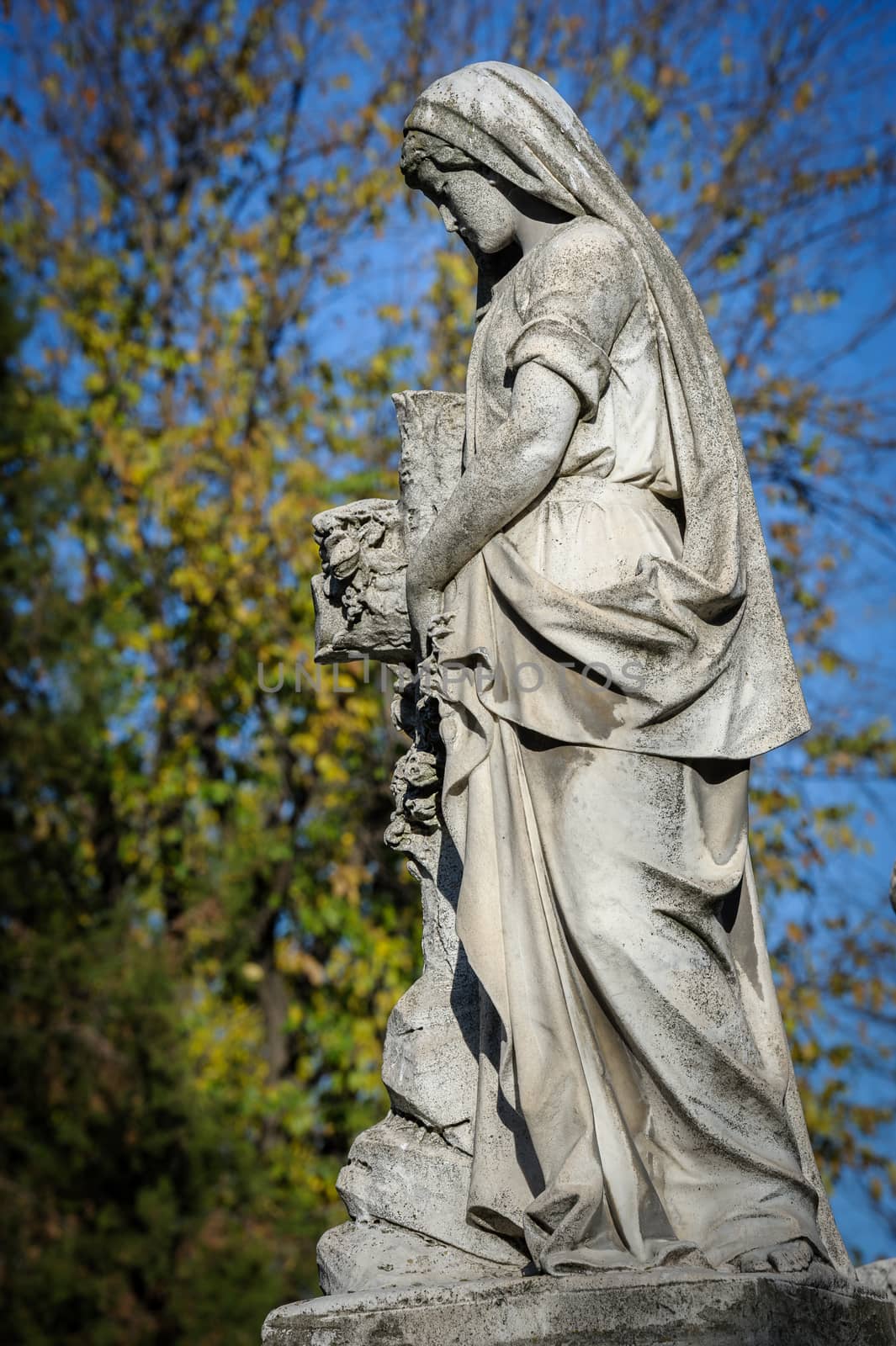 Stone cemetery statue by starush