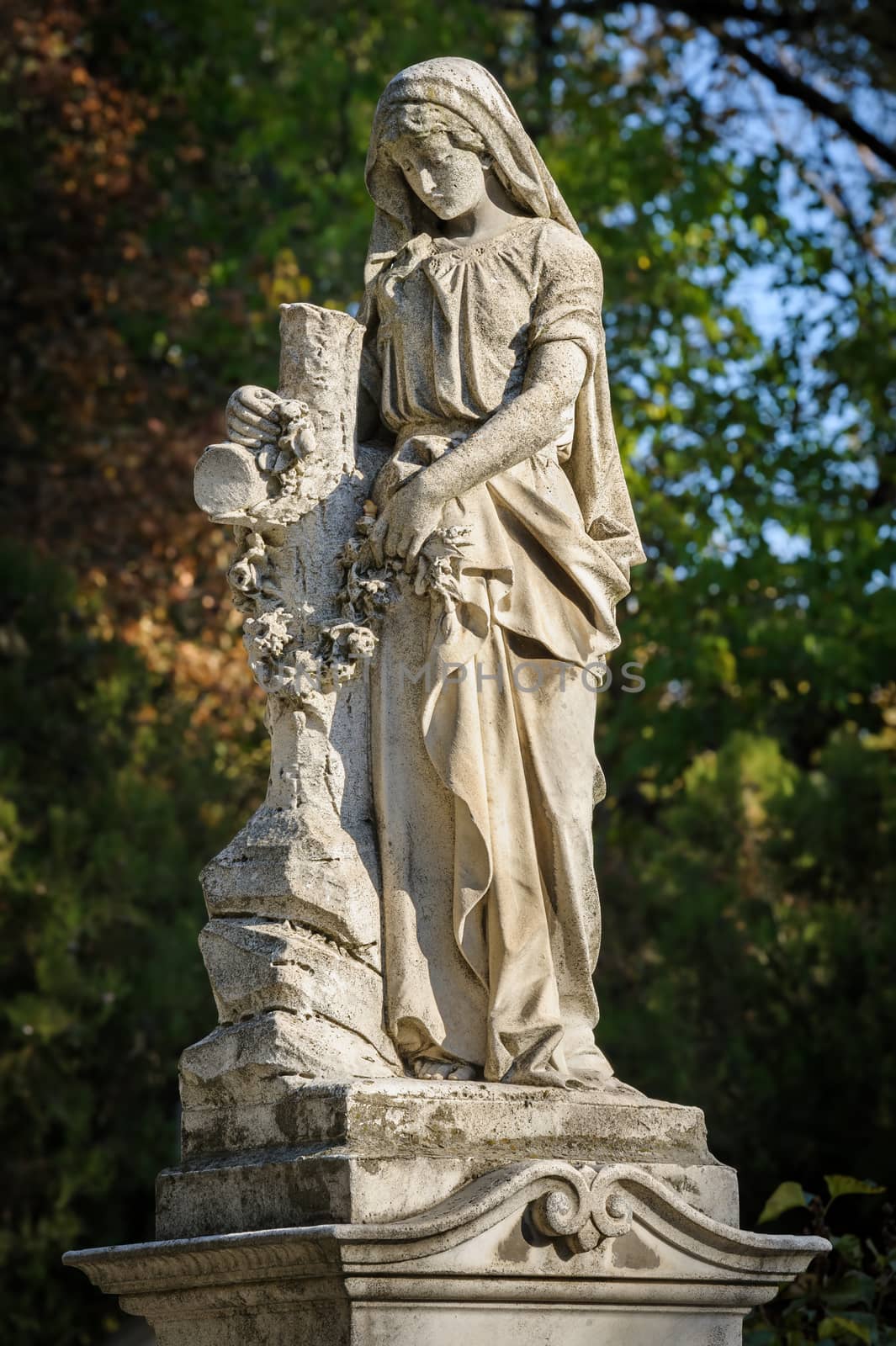 Stone cemetery statue by starush