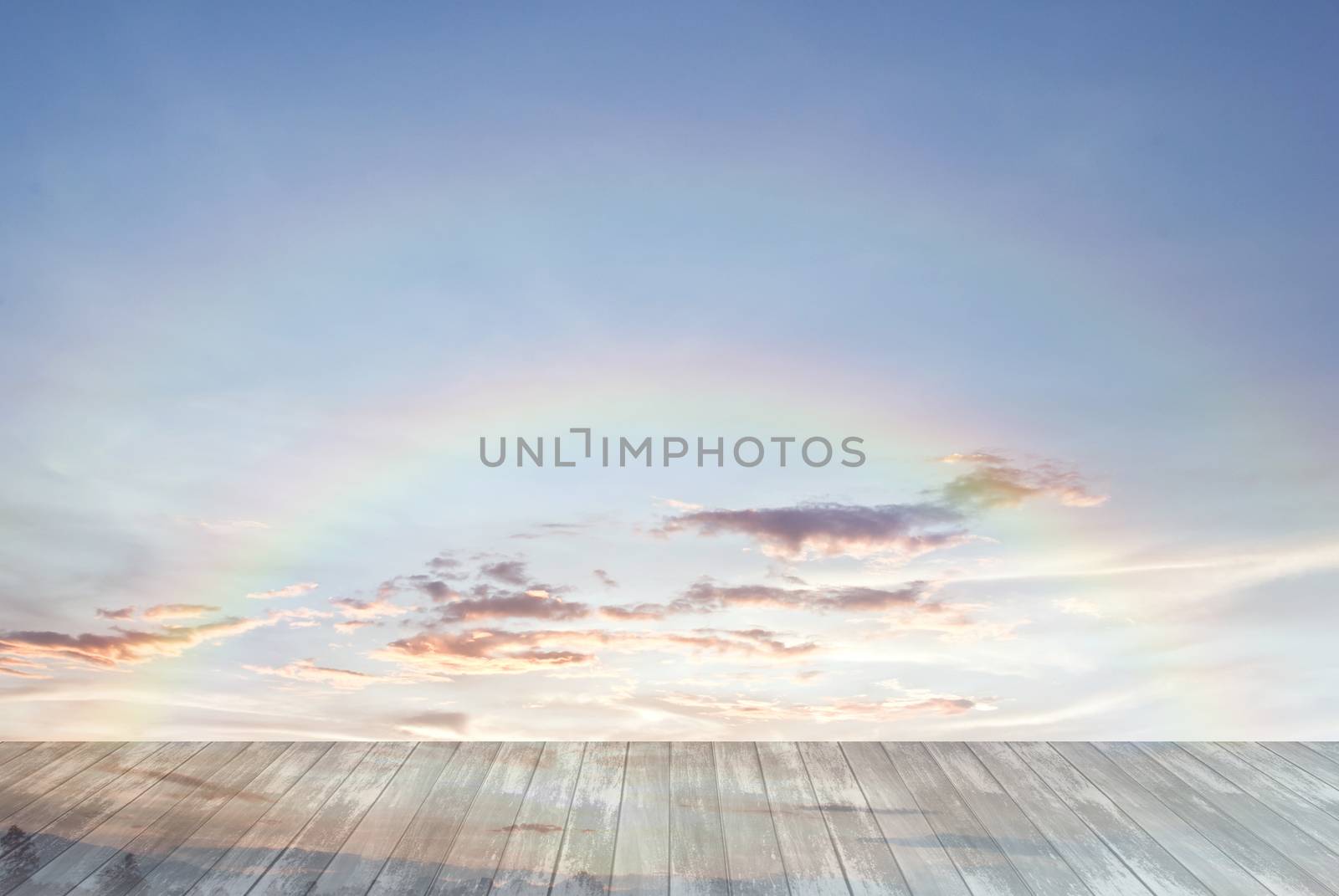 old wooden texture and rainbow in blue sky background by rakoptonLPN