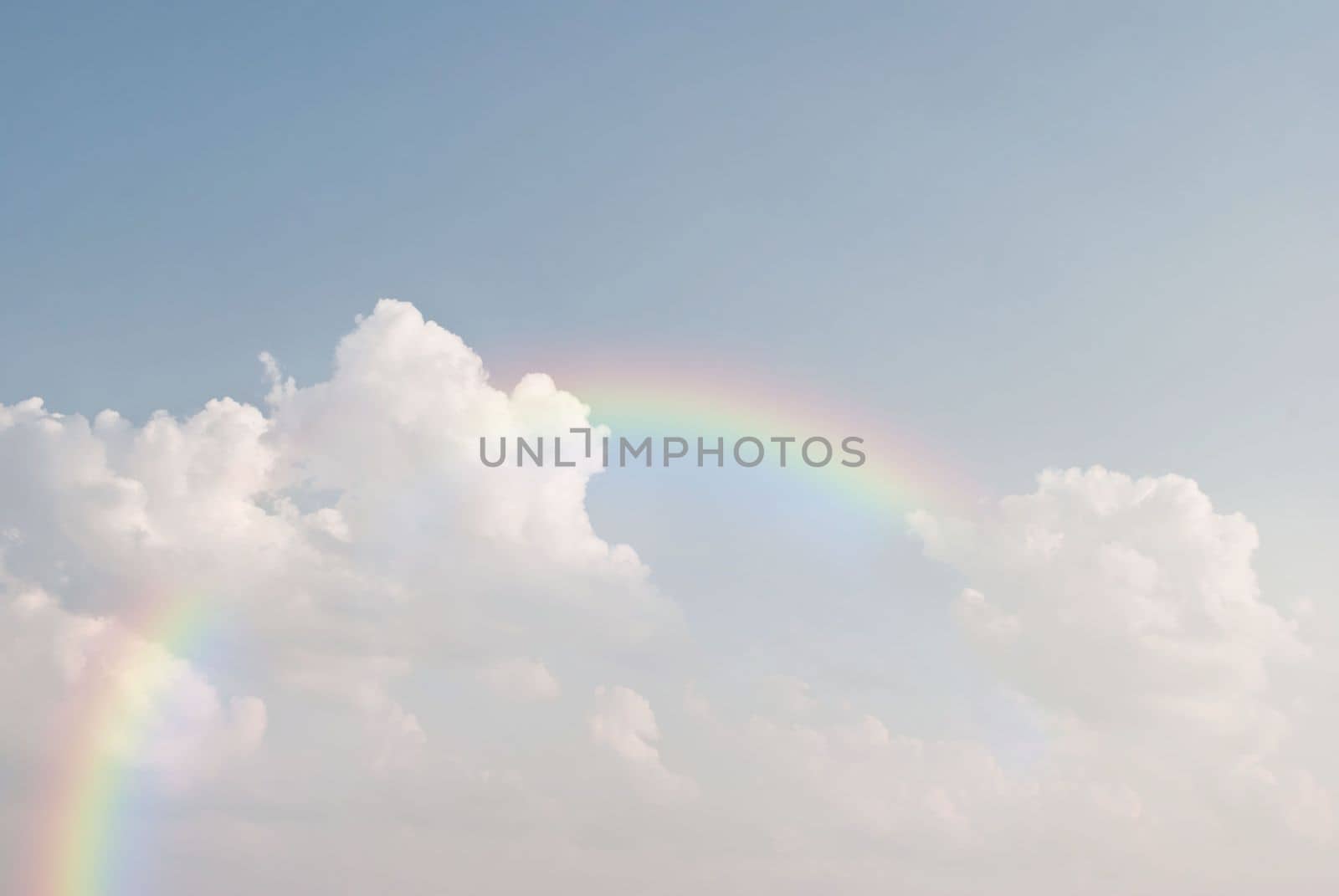 rainbow in the blue sky after the rain by rakoptonLPN