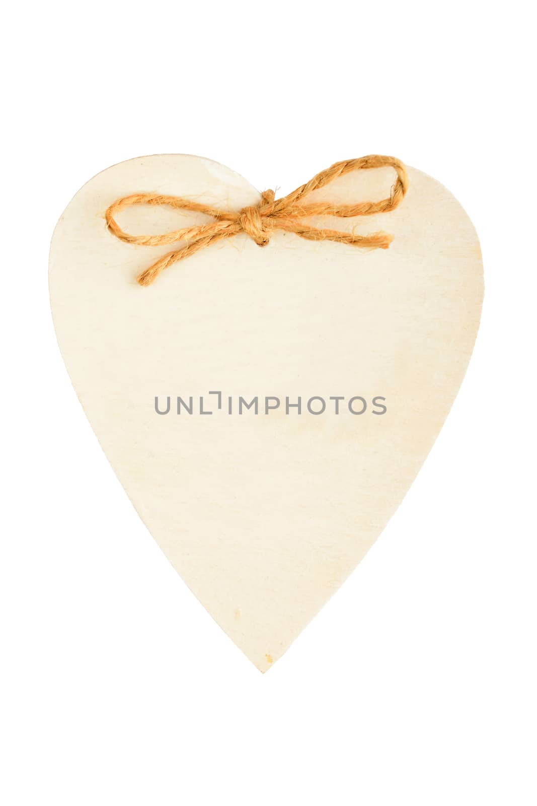 Beige painted romantic wooden handmade souvenir heart with burlap jute rope and copy space isolated on white